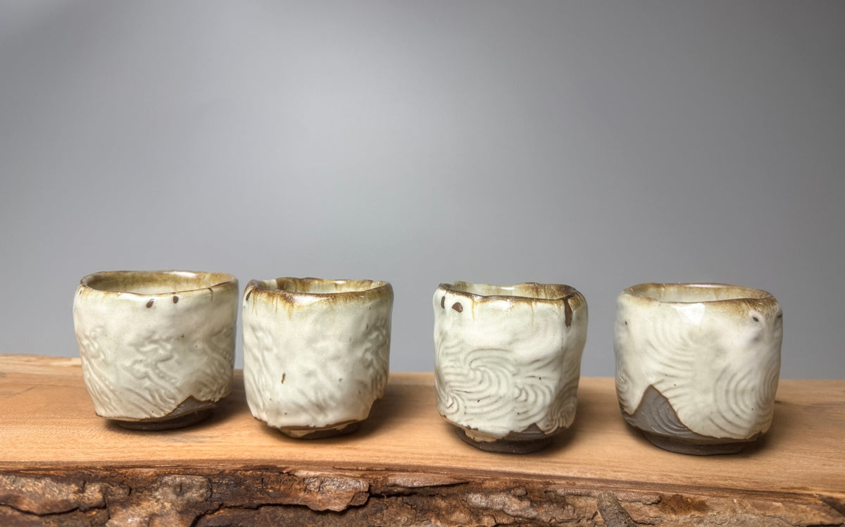 A set of 4 sake/teacups