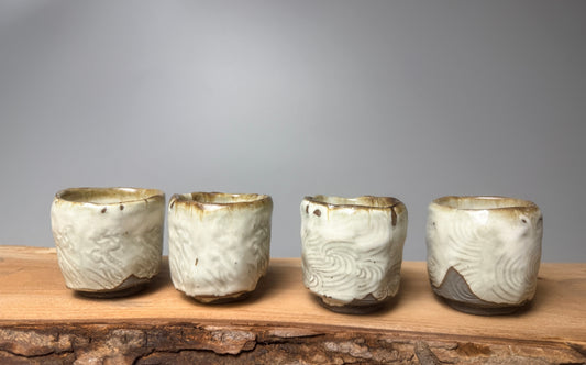 A set of 4 sake/teacups